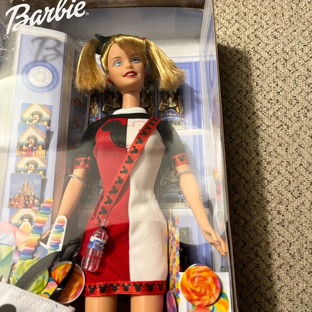 Disney exclusive Barbie.  Never been out of box.  Box has a crinkle as…